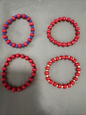 Woman’s handmade 4 Red Beaded Stretch Bracelets